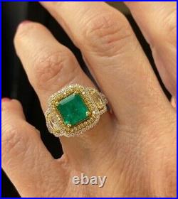 Vintage Art Deco Halo Design With 16.62 CT Colombian Emerald & Fancy Cut CZ Ring